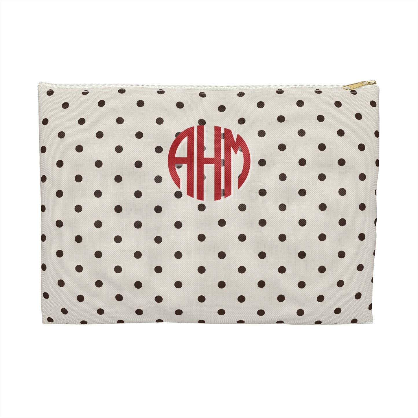 Polka dot pouch with red monogram on a white background
