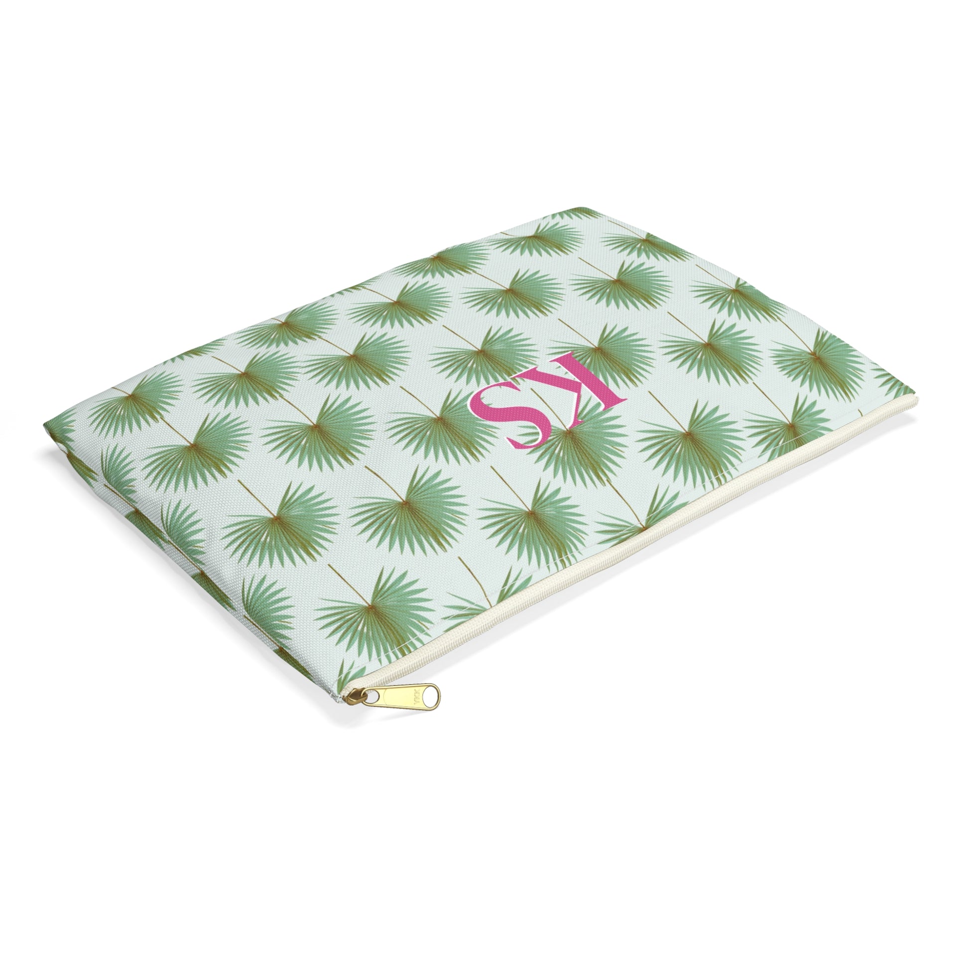 cosmetic travel bag with repeating pattern of green fan palm leaves on white background