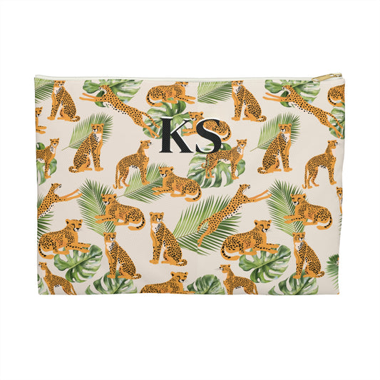 Fabric with cheetah and leaf pattern and 'KS' initials on a white background