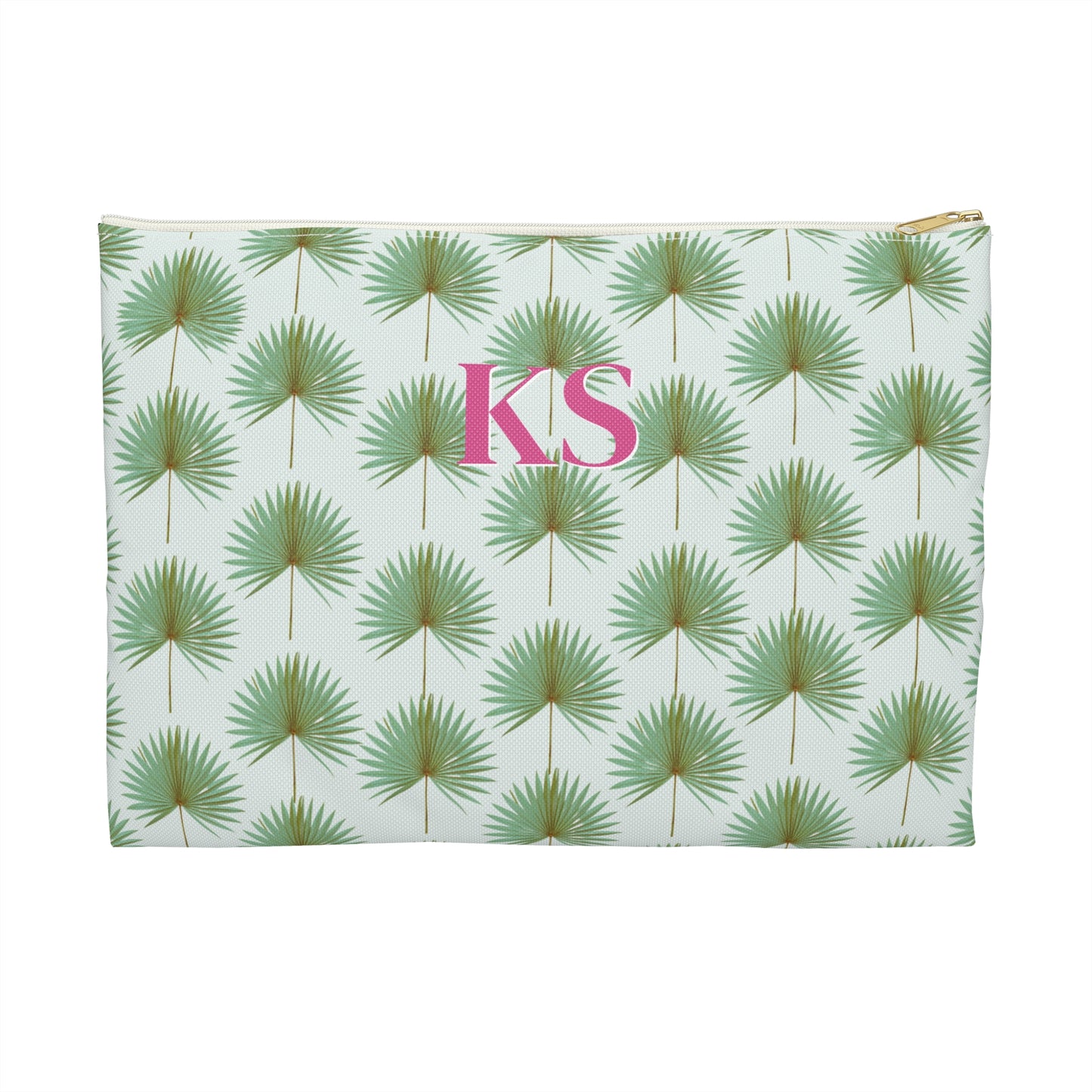 Monogrammed cosmetic travel bag with repeating pattern of green fan palm leaves on white background