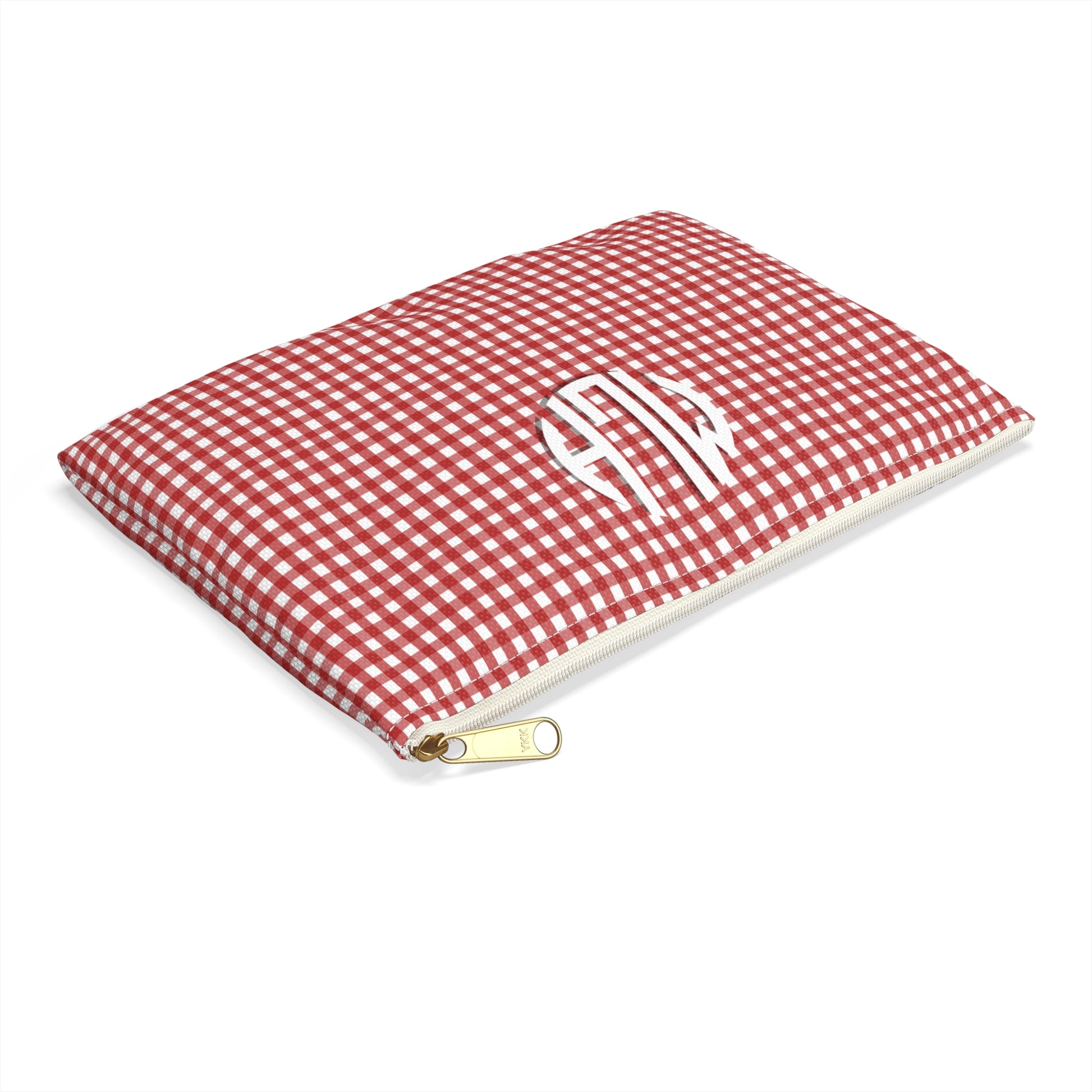 Red and white checkered pouch with a gold zipper on a white background