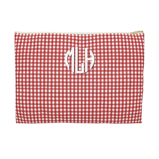Red and white checkered pouch with 'MLH' monogram on a white background