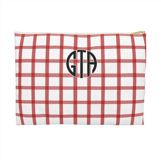 Red and white checkered pouch with 'GTA' monogram on a white background