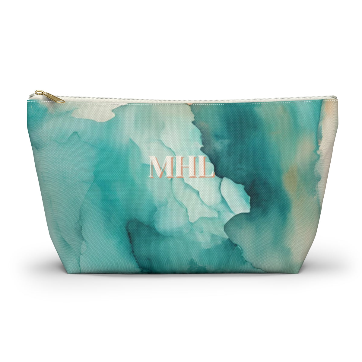 Monogrammed cosmetic travel bag in a cream, turquoise, and orange abstract watercolor print