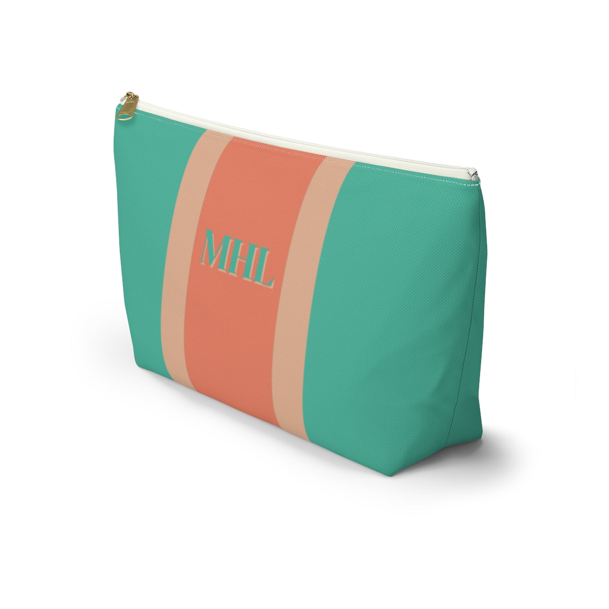 angled side view of Monogrammed cosmetic travel bag with orange and turquoise stripes and white and gold zipper