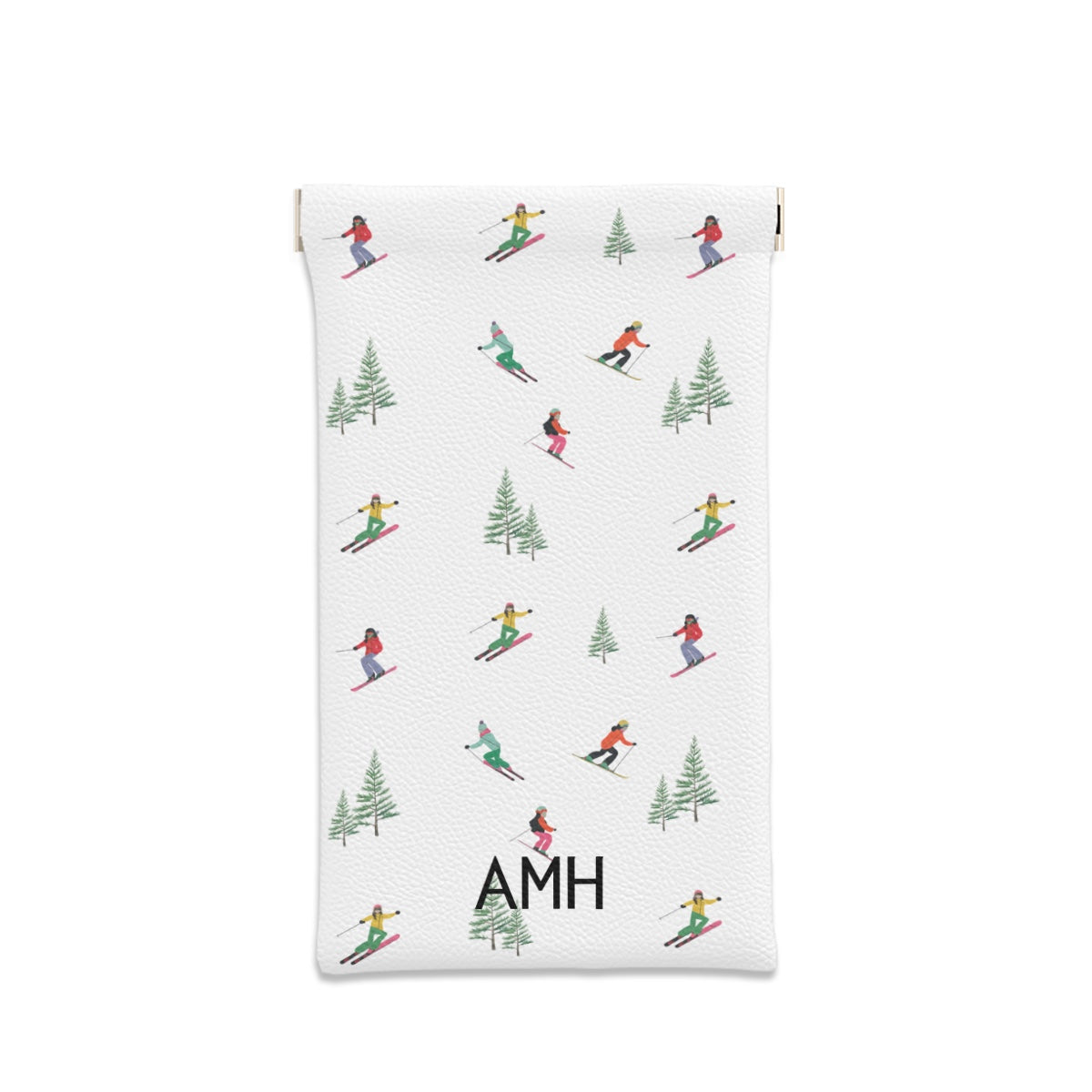 sunglasses case with repeating pattern of skiers and pine trees