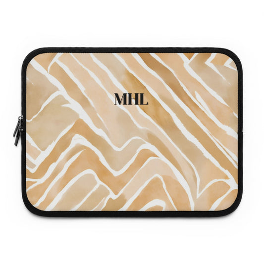 Monogrammed neoprene laptop case in a light tan, apricot  and cream abstract pattern 