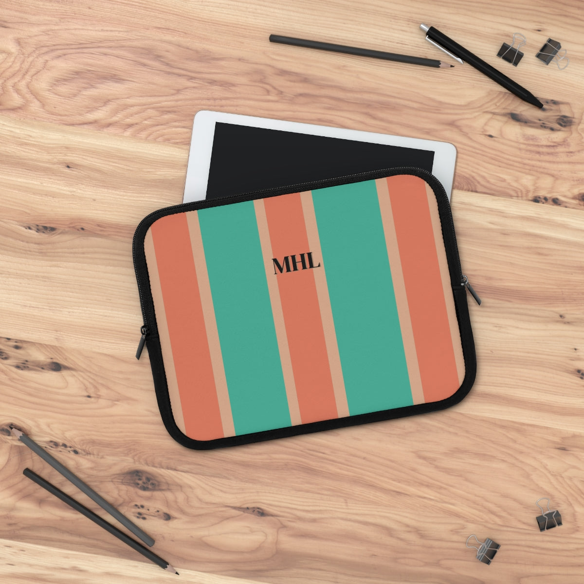 monogrammed neoprene laptop case with vertical turquoise and orange stripes