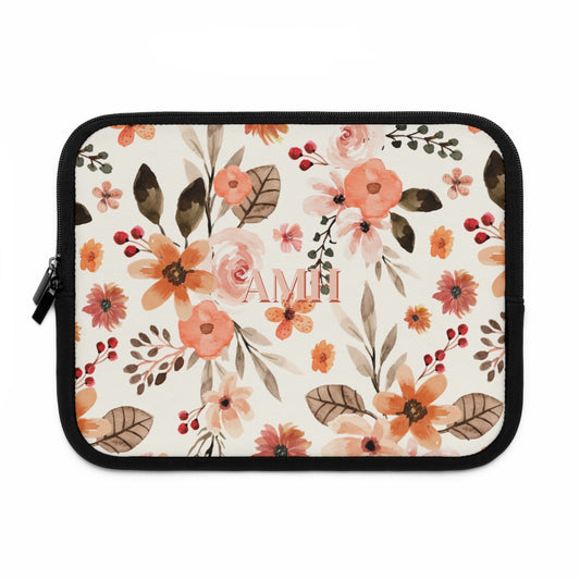 front view of neoprene laptop sleeve  with pink monogram with vintage pink floral design background