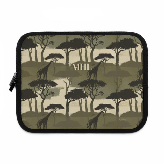 monogrammed laptop case with repeating giraffe and tree pattern in olive green and cream