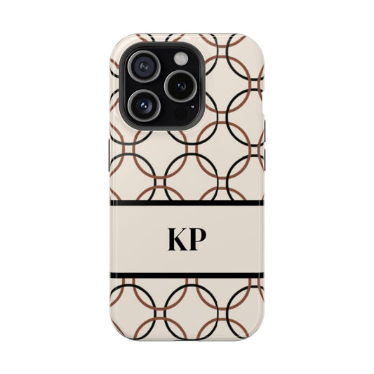 personalized magnetic tough iPhone case with black monogram on a cream background with repeating design of interlocking brown and black circles