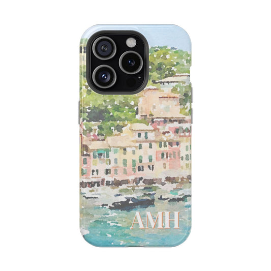 Personalized magnetic tough iPhone case with white monogram set against a background watercolor of Portofino