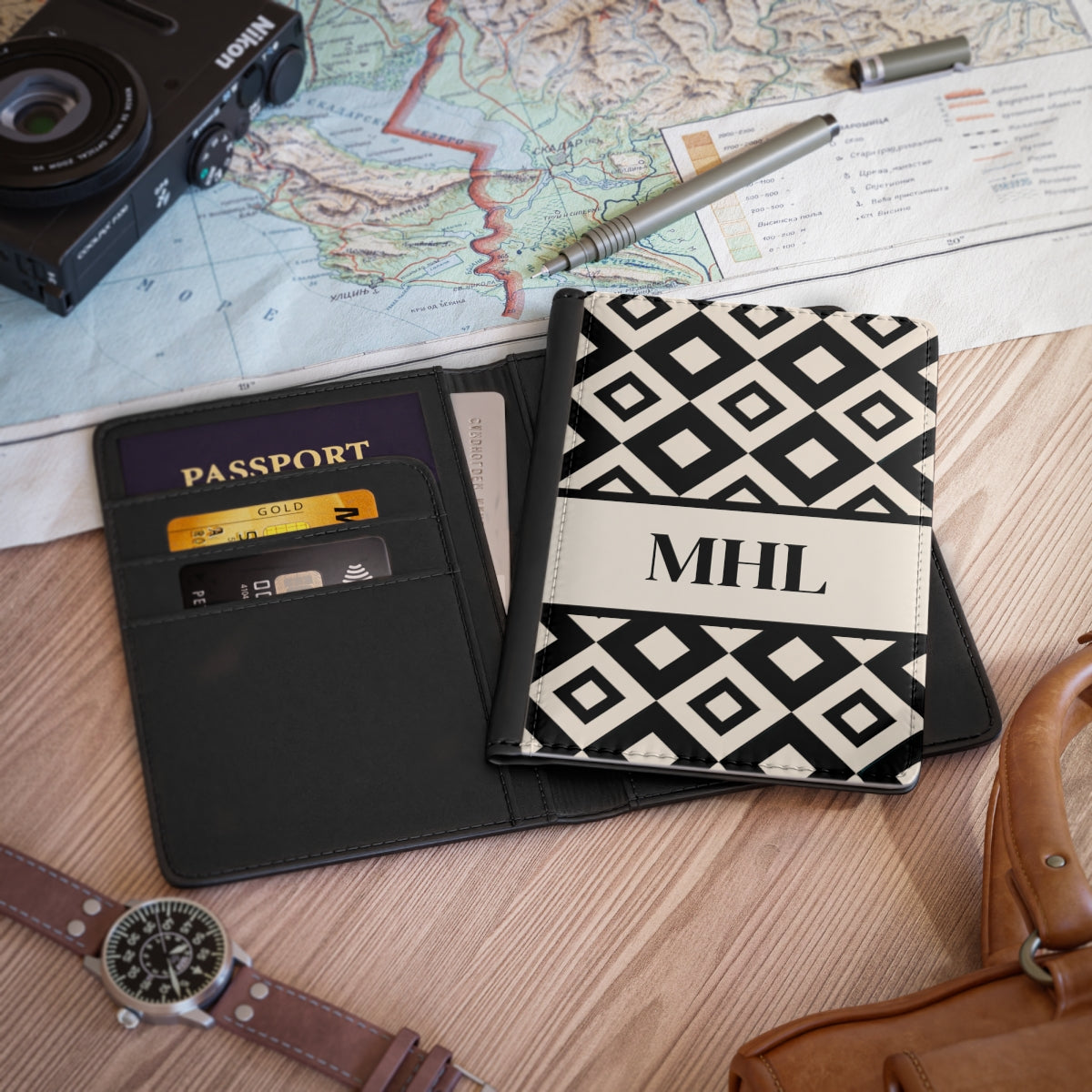 personalized passport cover with a repeating pattern of cream and black diamond shapes