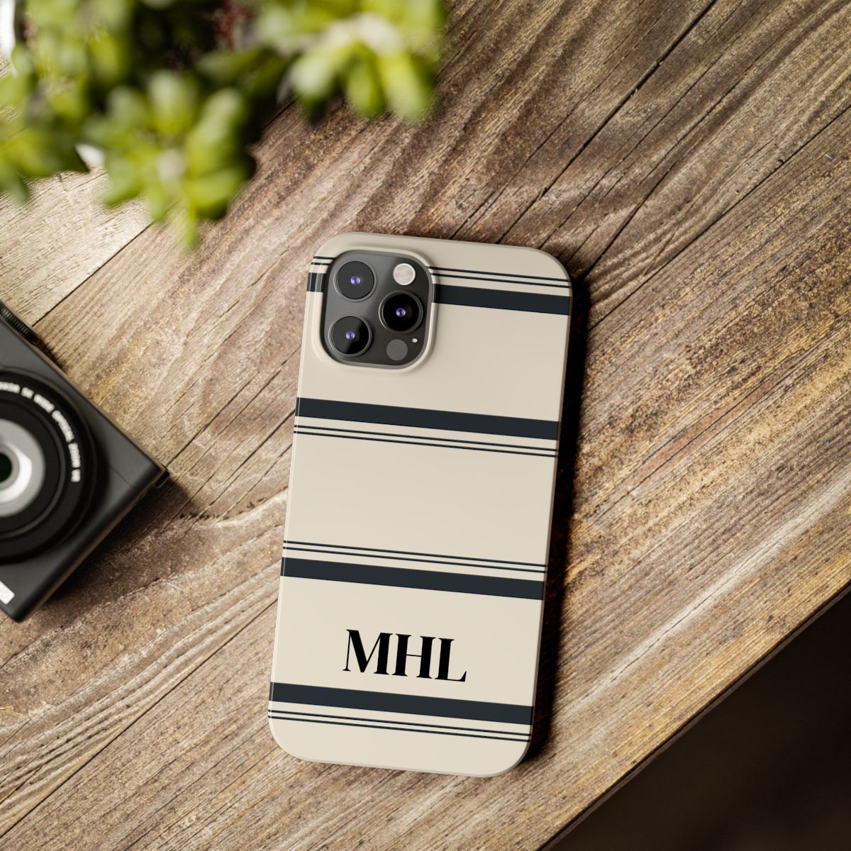 personalized slim iPhone case with black monogram and horizontal black and cream striped pattern