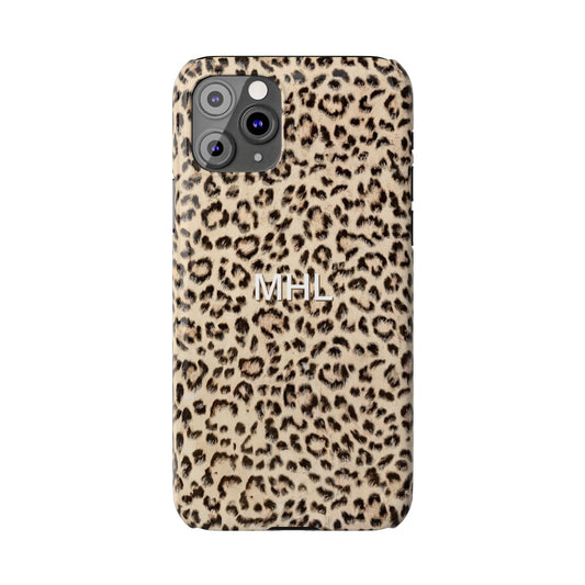 front view of personalized slim iPhone case with white monogram on a cheetah print background