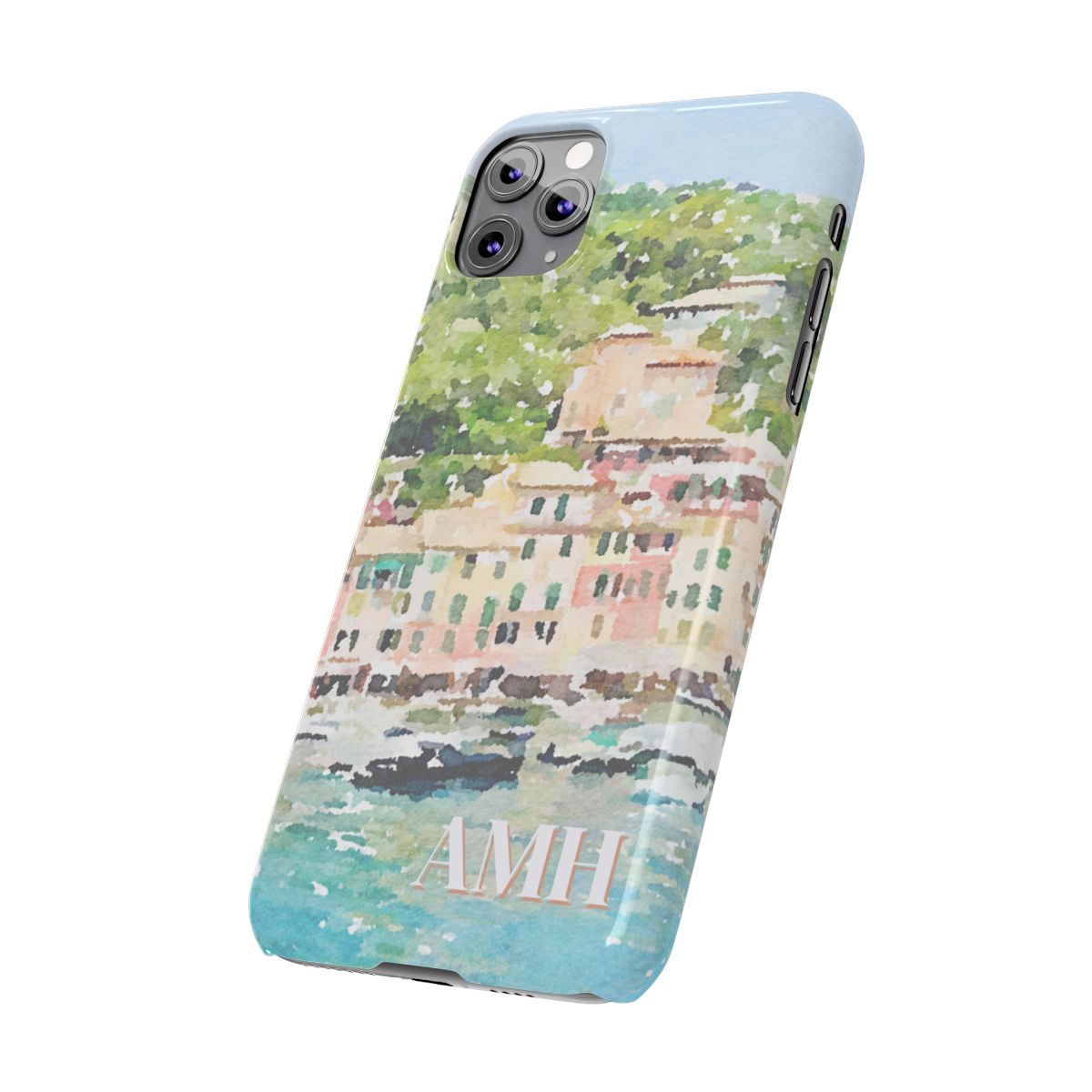 Angled front view of personalized slim iPhone case with cream monogram on a background image of Portofino in a watercolor style.